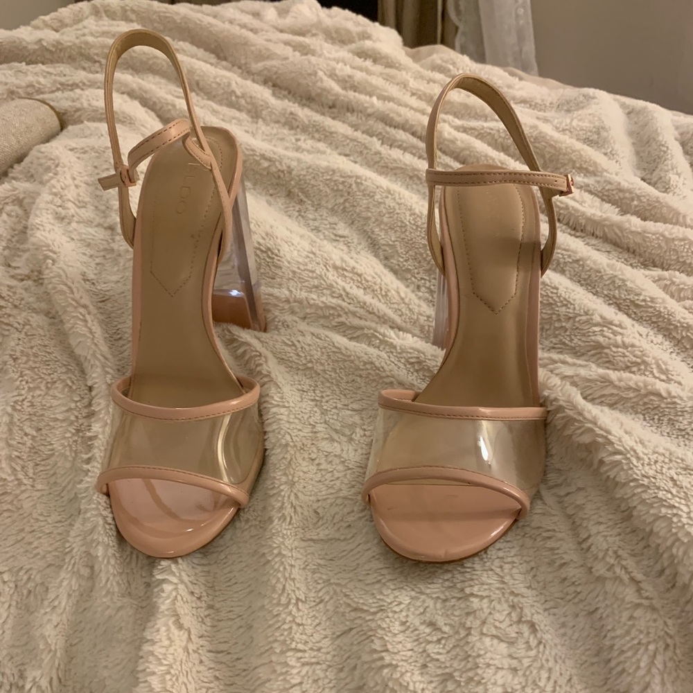 Tan and clear pumps